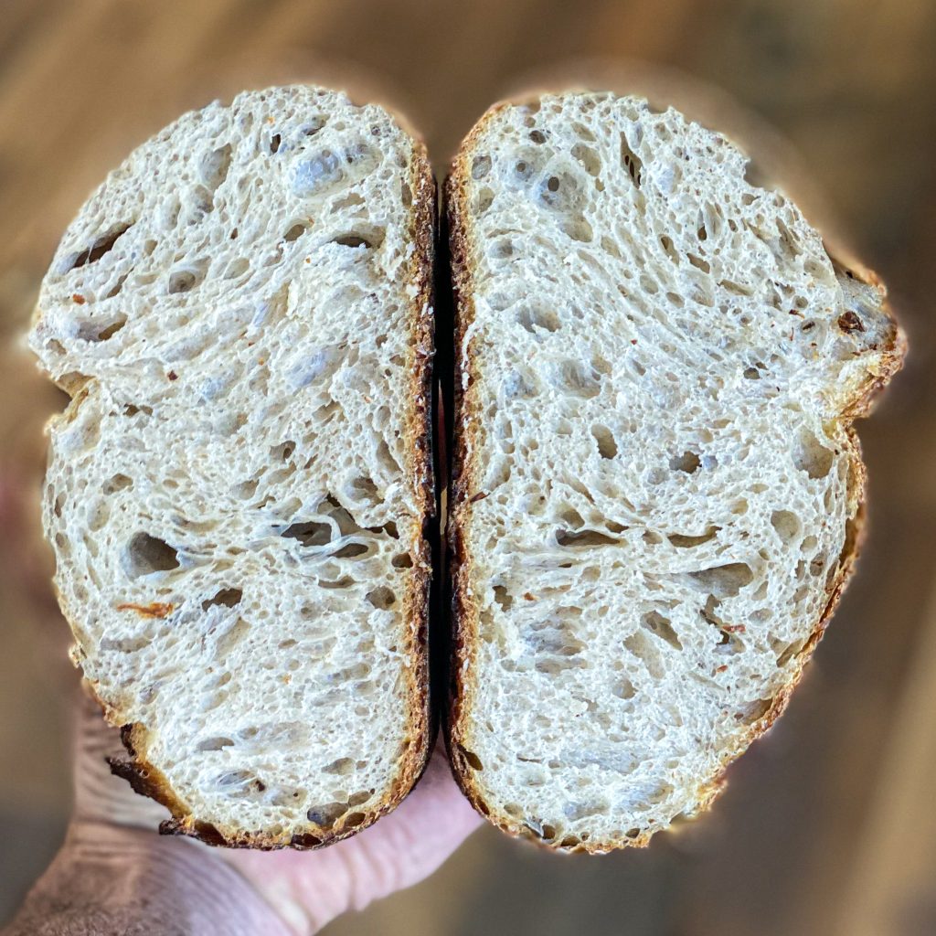 sourdough bread cut in half to show the crumb